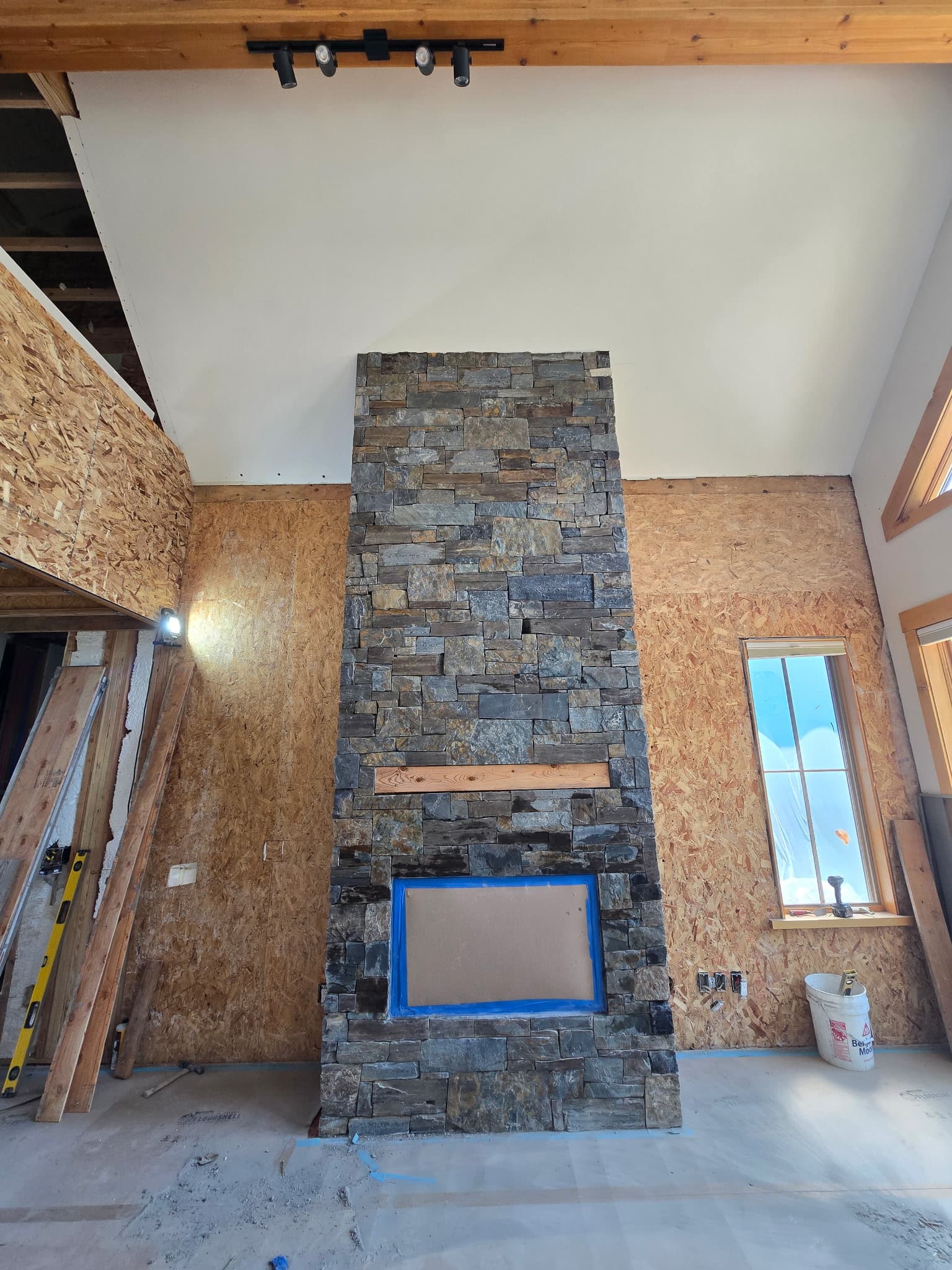 Finished fireplace remodel by Cowboy State Capital in Jackson Hole, Wyoming